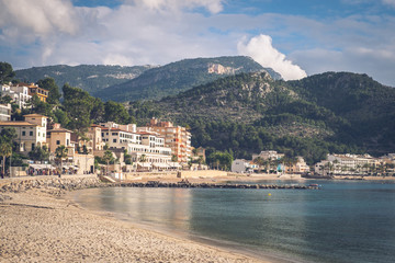 Town Port de Soller, Mallorca, Spain. Bay, sandy beach, ocean, boats.