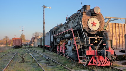Naklejka premium steam locomotive on the station