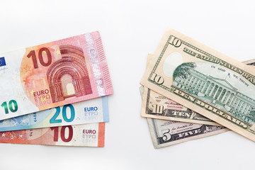 American euro and dollars banknotes for business design. Cash money various currency paper bills on white background.