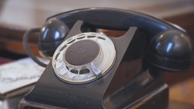 The old disk phone is made in the USSR.