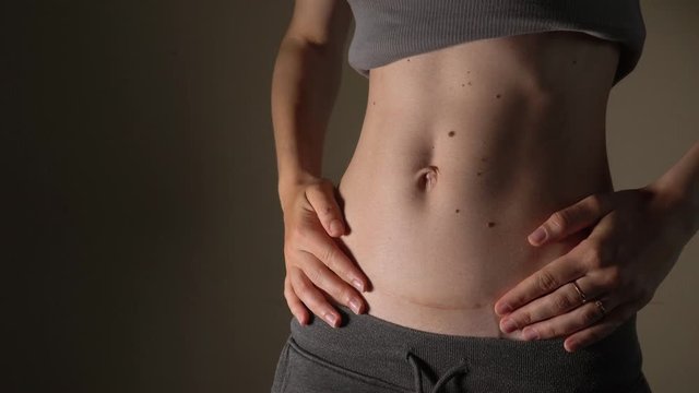 C section Cesarean operation heal after mother holding baby postpartum recovery