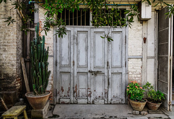 Fototapeta na wymiar Rustic wooden door of rural house