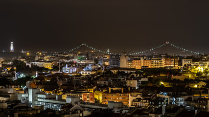 Fototapeta na wymiar Rooftop View of Lisbon City at Night