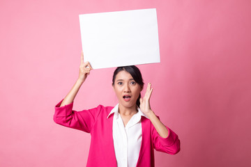 Young Asian woman surprise with white blank sign.