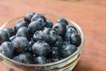 Blueberries on wooden table, closeup