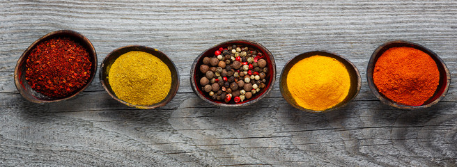 Wooden table of colorful spices