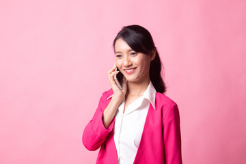 Young Asian woman talking with mobile phone.