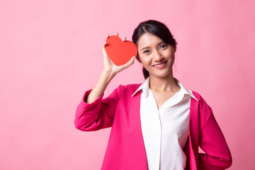 Asian woman with red heart.