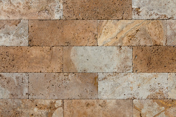 Background, wall texture of natural stone blocks.