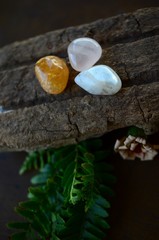 Crystal Kit: Citrine, Rose Quartz, and Moonstone. Crystal variety pack, Tumbled Crystal bundle. Small tumbled healing crystals in natural lighting, witchy Wiccan tools. 