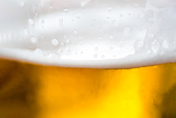 Macro shot of beer in glass