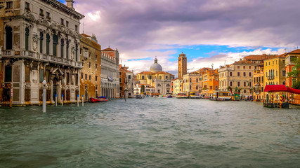 Venice, Italy boats and city skyline on the Grand Canal with San Geremia Church in background