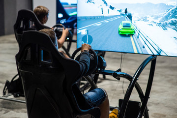 Boy play the video game with virtual reality device