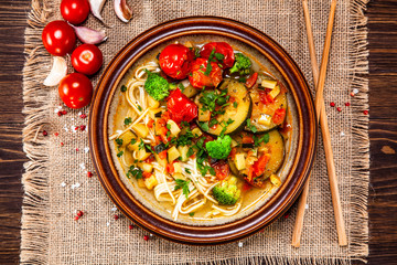 Ramen - soup with noodles and vegetables 