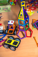 Children's constructor for the development of fine motor skills and creative thinking. Bright and colorful, allows you to create complex shapes. Close-up.