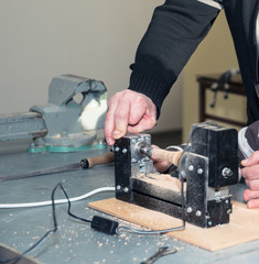 Children learn to make custom objects in fablab classes. Joiner's training on makerfaire.