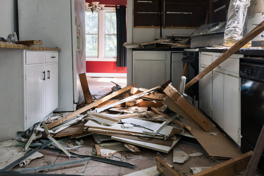 Kitchen: Pile Of Refuse On Floor From Demo