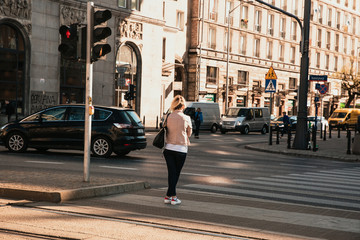 woman at traffic lights.woman at the crosswalk