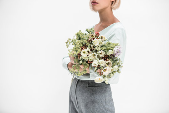 woman holding a boquet