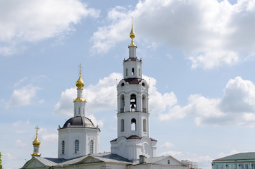 Fototapeta na wymiar domes of church with crosses against the sky