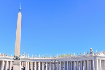 Fototapeta na wymiar Bernini Colonnade and Egyptian Obelisk at St. Peter's Square, Vatican City