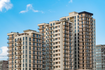 new multi-family houses against the blue sky