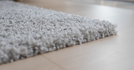 Grey carpet on the floor at home