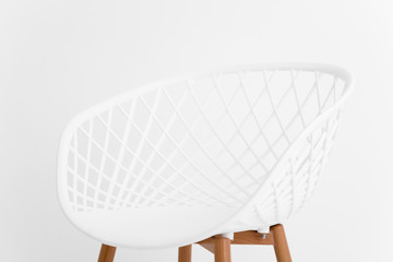 Minimalist chair isolated over clean seamless background