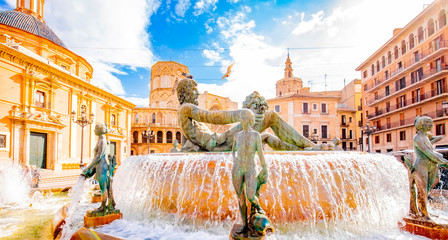 Fototapeta na wymiar Historic Turia Fountain (Fuente del Turia) with Neptune statue in Valencia