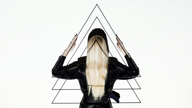 Woman against slide with triangles