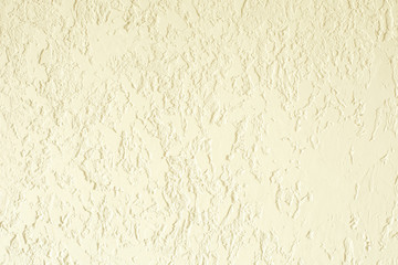 Sand color textured plastered wall. Fresh otvetka in commercial premises, designer renovation in the house