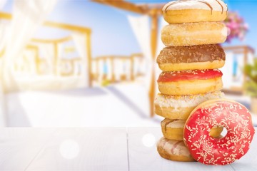 Delicious glazed doughnuts isolated on white background