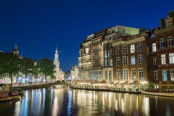 Fototapeta na wymiar Amsterdam, Holland - May 13, 2019: Night view of the Amsterdam canals