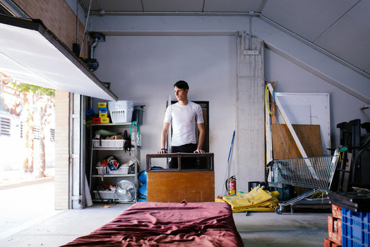Man standing in garage