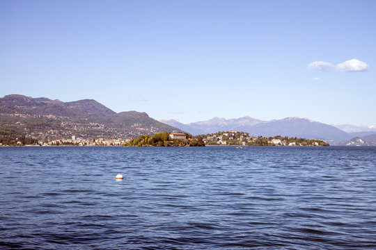 Scenic view of beautiful Lago Maggiore lake and mountains in Piedmont Italy Europe. Travel and vacation concept.- Image