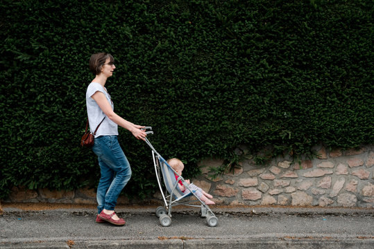 mother pushing a stroller
