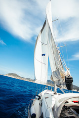Obraz premium Sailing. Ship yachts with white sails in the open Sea