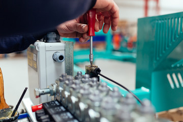 Reparing an engine in the factory.