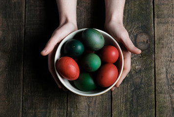 colored easter eggs in a bowl