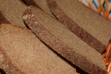 rye bread in a wicker vase sliced