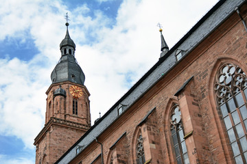 Fototapeta na wymiar Tower of most famous church in Heidelberg, Germany, Church of the Holy Spirit, called 'Heiliggeistkirche' in German