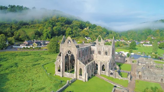 Aerial drone footage of the ruins Tintern Abbey, located on the Welsh boarders. 