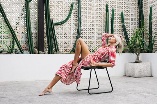 Summer Style - Sexy Young Long-Legged Woman Posing in Chic Retro