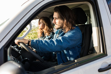Beautiful young, wild couple in the countryside or seaside in Tu