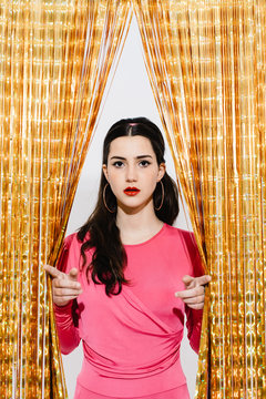 Fototapeta Woman spreading string curtain