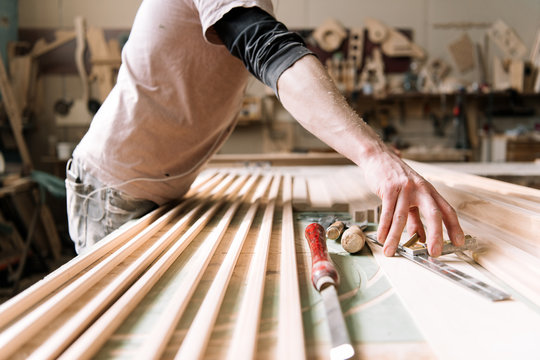 Crop carpenter taking tool