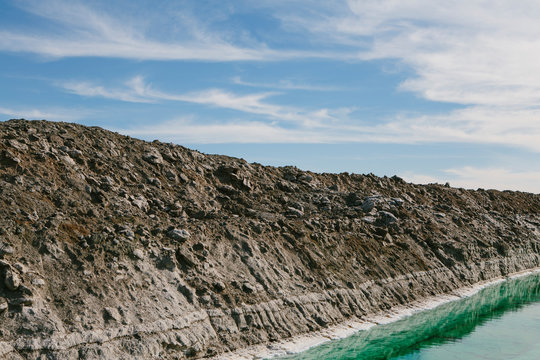Calcium chloride mine tailings and canal in desert