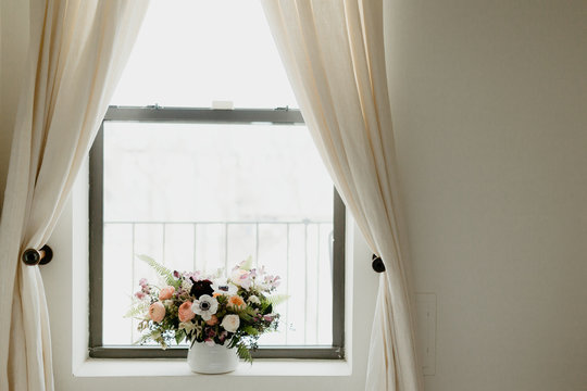 Wedding Bouquet Sitting on a Window Sill