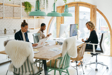 Female team working in a modern office.