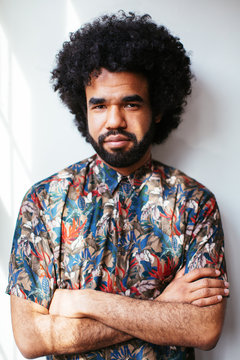 Portrait Of An Afro Man Wearing Flowered Shirt.